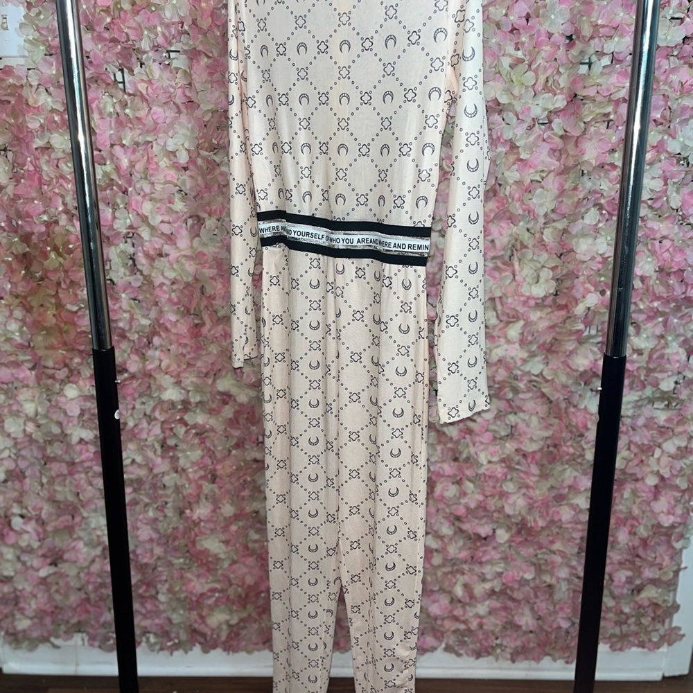 Stylish Cream Jumpsuit with Black Accents